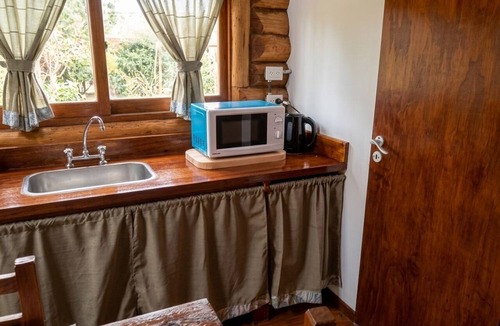 Villa Lia Apartment | Rustic cabin with a pool.