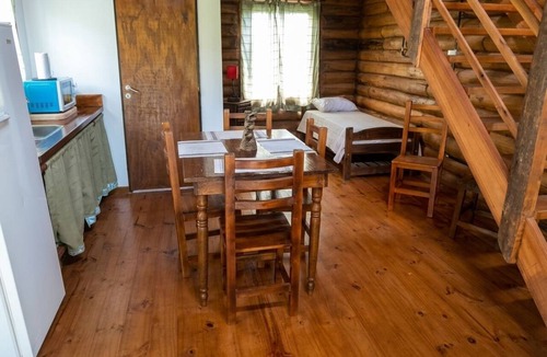 Villa Lia Apartment | Rustic cabin with a pool.