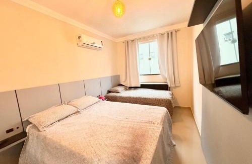 Ze Amandio Apartment | Seu refúgio em Bombinhas, conforto e pé na areia