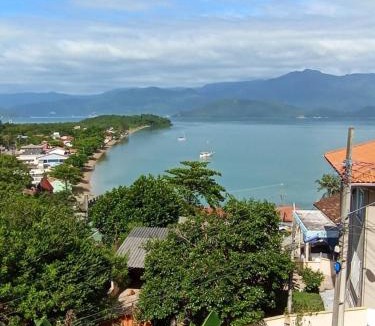 Caiacanga Apartment | Sossego, Linda vista, praia 400mts e home-office