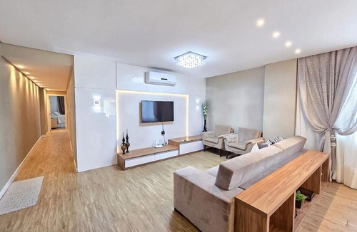 Andorinha Apartment | Spacious 3 Suite Apartment with BBQ and 2 Parking Spaces in Meia Praia Itapema