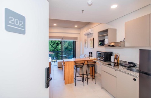 Fernando De La Mora Apartment | Spacious One-Bedroom Near Shopping and Dining