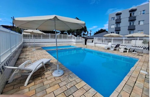 Matinhos Apartment | Studio with Club Amenities: Pool, 5G Wi-Fi, Parking & 300m from the Sea