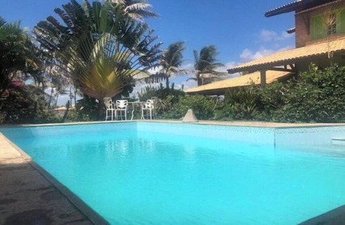 Aguas Belas House | Stunning beachfront villa with a pool and a large tropical garden