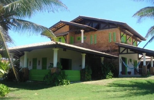 Aguas Belas House | Stunning beachfront villa with a pool and a large tropical garden