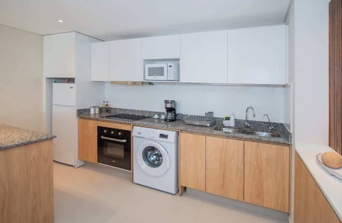 Asuncion Apartment | Stylish Stay with Private Patio, Pool & Gym Access