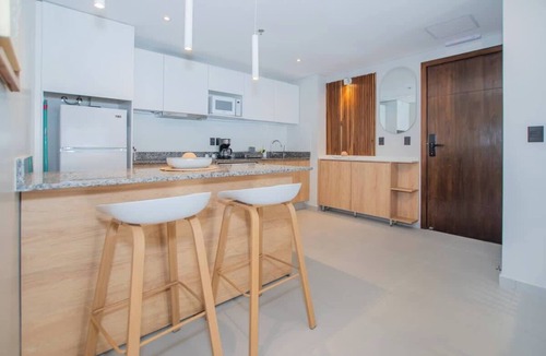 Asuncion Apartment | Stylish Stay with Private Patio, Pool & Gym Access