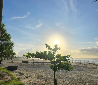 Enseada Apartment | Suíte aconchegante beira mar - Suíte 255
