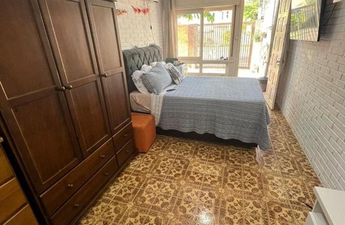 Guaratuba House | Suíte aconchego dos pássaros