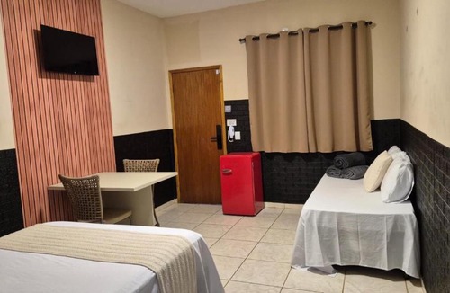 Rubineia House | Suíte, hospedagem econômica com conforto de lazer.