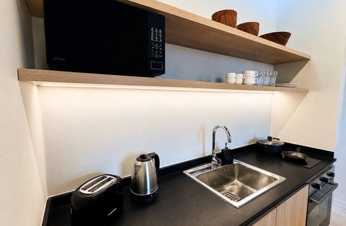 San Martin de los Andes Apartment | Suite Patagonia Studio · Brand-new boutique apartment with mountain views and a balcony | Ski in winter; trekking, fishing, and kayak in summer