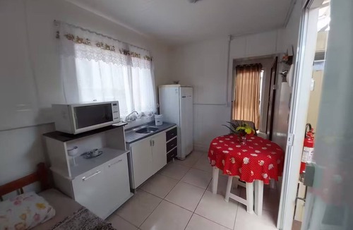 Cidade Nova Apartment | Suite with morning sun + air conditioning