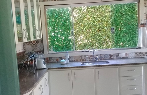 Capitolio House | Sustainable house in Escarpas do Lago, 4 suites, solar energy.