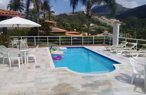 Capitolio House | Sustainable house in Escarpas do Lago, 4 suites, solar energy.