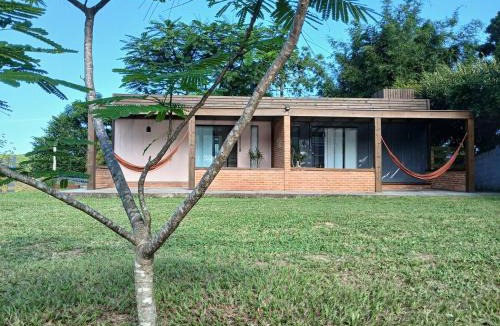 Rio Vermelho Sul House | Terra das Palmeiras casa container praia do Moçambique