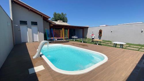 Parque das Americas House | TROPICAL LAZER E EVENTOS - Casa em Lucas do Rio Verde