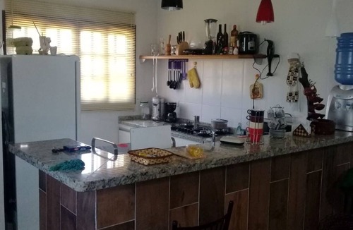 Morro do Algodao House | Two-story house in a gated community