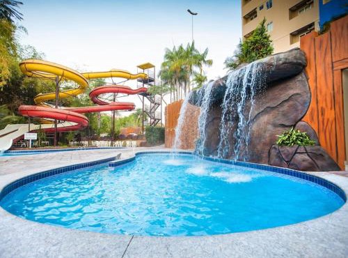 Águas Termais Naturais Piscinas Quentes 24 horas mais Acesso Incluso aos Parques Aquáticos dos Resorts Golden Dolphin Grande Hotel em Caldas Novas