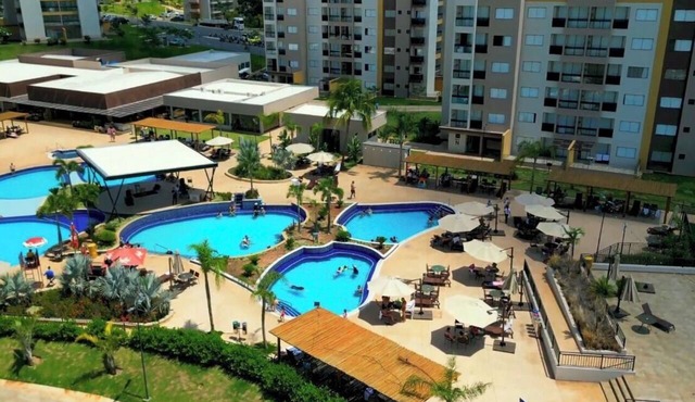 2-bedroom apartment with balcony and views of Lake Corumbá at Praias do Lago Eco Resort.