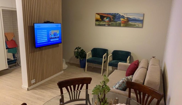 Apartamento pé na areia com piscina aquecida