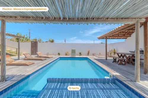 Apartment with barbecue in Pontal do Maceió Tactu
