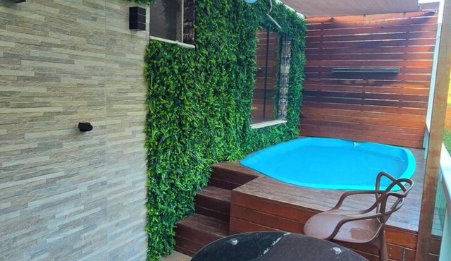 Apartment with hot tub, heater, and dry sauna. in Cataguases