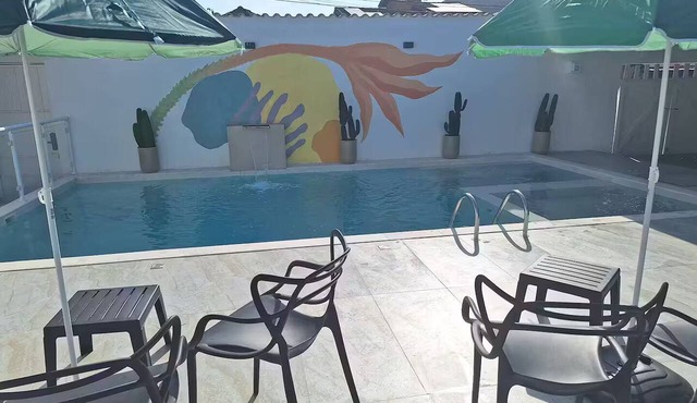 Beach, pool and barbecue.