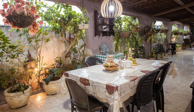 Casa com Ar, Lareira e Churrasqueira no Centro