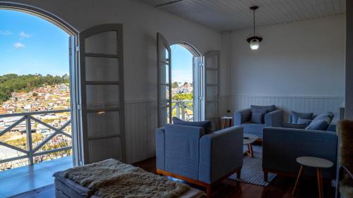 Casa com lareira, Wi-Fi e varanda com vista