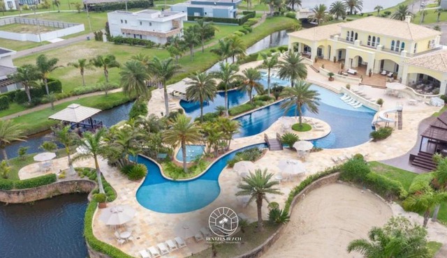 Casa Condomínio 5 suítes com piscina a 350m do mar
