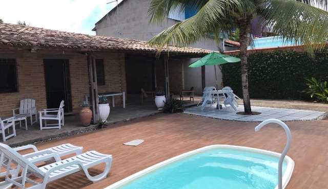 Casa de Veraneio, com piscina, churrasqueira, área de lazer, três suites com ar condicionado a 100m da praia, na Barra de São Miguel-AL in Barra de São Miguel