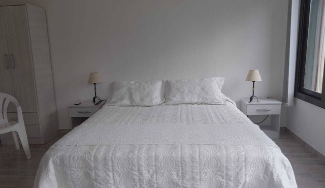 Cozy 1-bedroom apartment in soothing Villa Ciudad Parque with AC