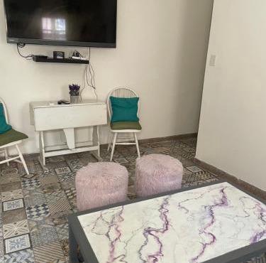 Departamento Ocre con gran jardín