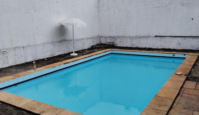 Espaço LD quarto com piscina