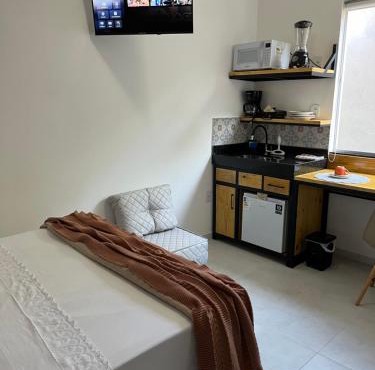 Flat com ar e varanda com linda vista para o Ibituruna, Wi-Fi - Véu de Noiva 204