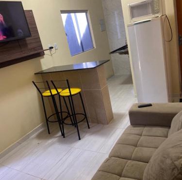 Flats com ar condicionado, garagem e internet