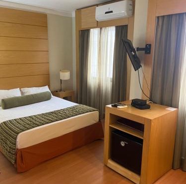 Hotel E suites em frente ao Aeroporto com ar e piscina 1703