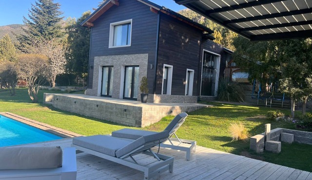 House with a pool and a gym
