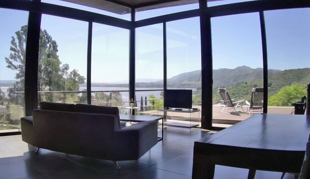 Lodge House, with full view of the lake and mountains.