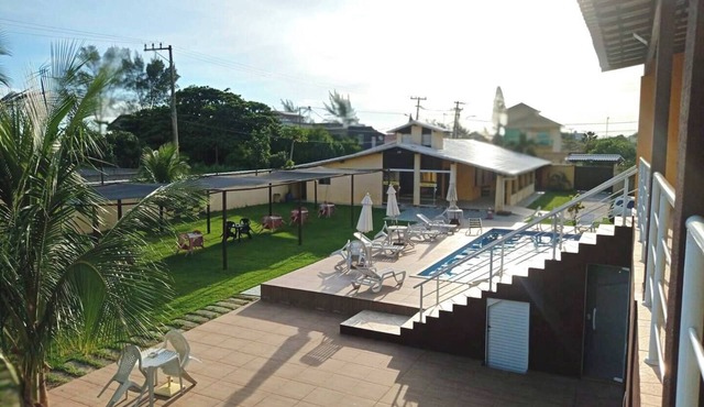 Quadruple suite, air conditioning, double bed, single beds, smart TV and minibar in Boqueirão Saquarema