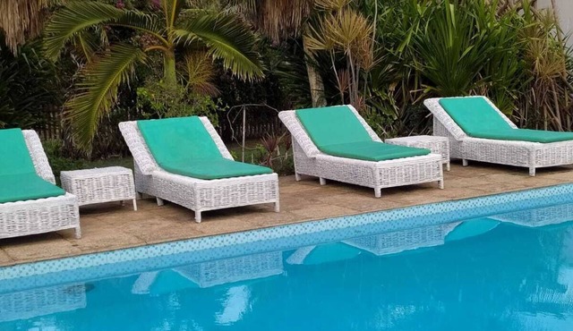 Stunning beachfront villa with a pool and a large tropical garden in Caponga