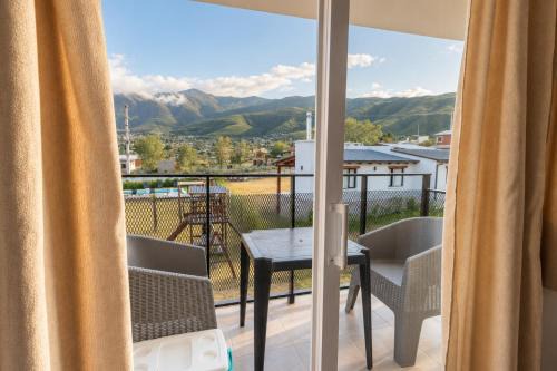 Suites Amplias y Comfortables - Con Balcon, Parquizado, Asador y Pileta