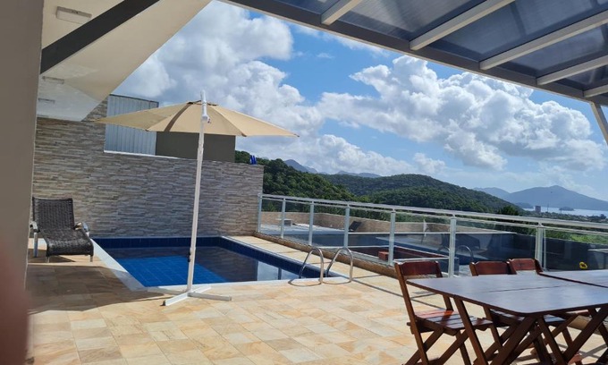 Balneario Copacabana House | Casa Vista pro mar e piscina em caraguatatuba