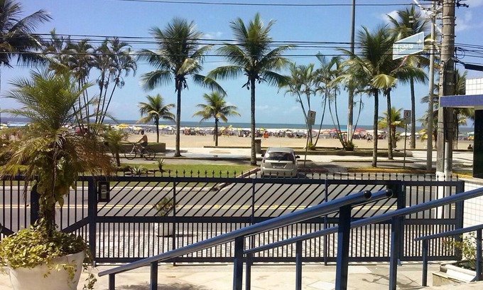Guilhermina Apartment | High standard beach front av beach with parasol chairs installed on the beach
