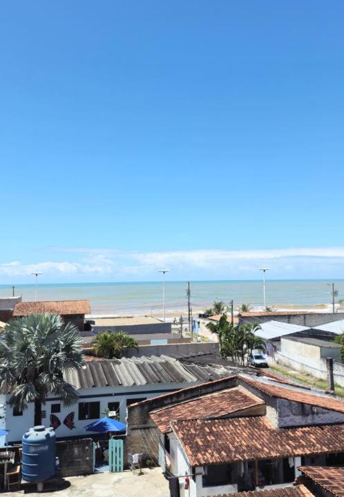 Estancia Monazetoca Apartment | Apartamento em Jacaraípe com quarto climatizado