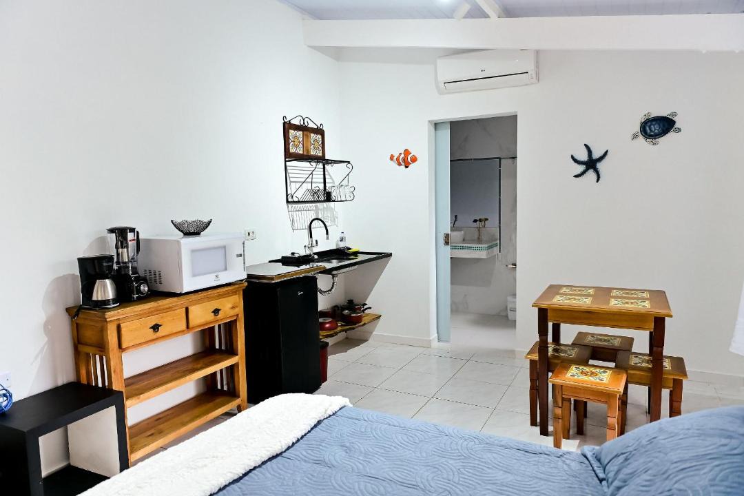 Feiticeira Ski Chalet | Jubarte Chalés | Conforto à beira da cachoeira