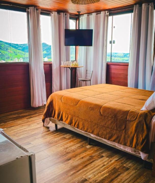 Photo of Bedroom in Santa Rita do Sapucai