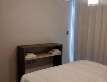 One-Bedroom Apartment with Balcony and City View