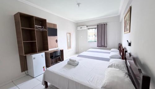 Deluxe with 01 Double Bed and 02 Single Beds