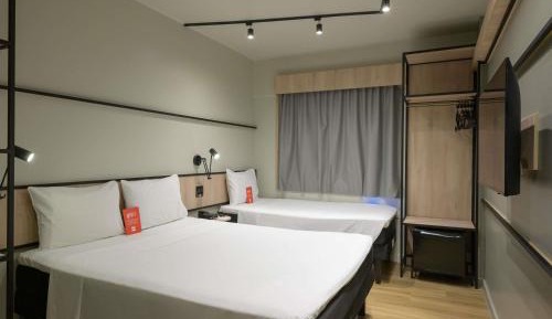 Room with a Double Bed and One Single Bed